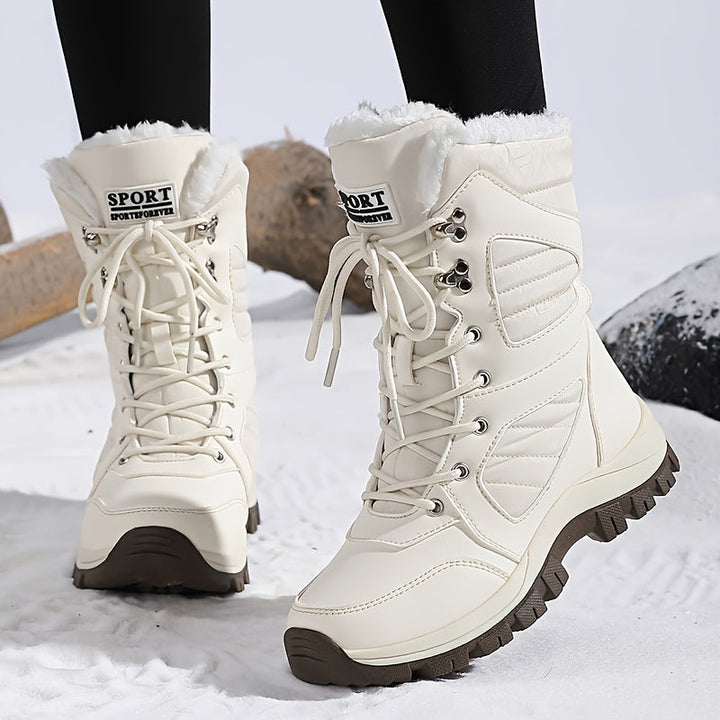 Corisande™ | Plush-lined lug-sole lace-up snow boots